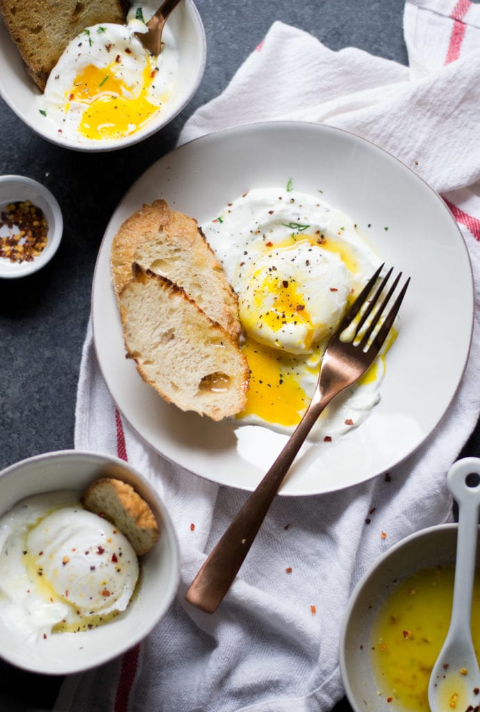 Turkish Eggs - Poached Eggs on top of garlic dill yogurt with a chili butter sauce | Sarcastic Cooking